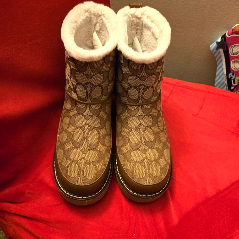Gently used AUTHENTIC Coach boots